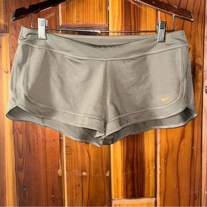Retro vibe brown Nike shorts with orange swoosh woman’s  large